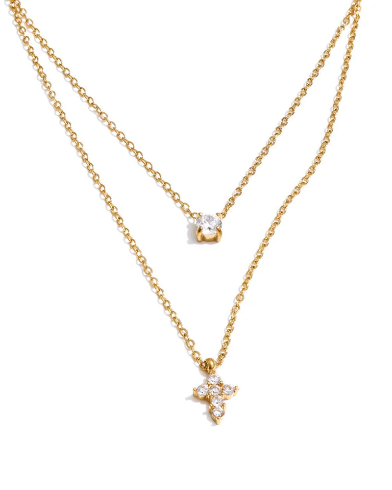 Collier croix double rang intemporel