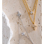 Collier croix double rang intemporel